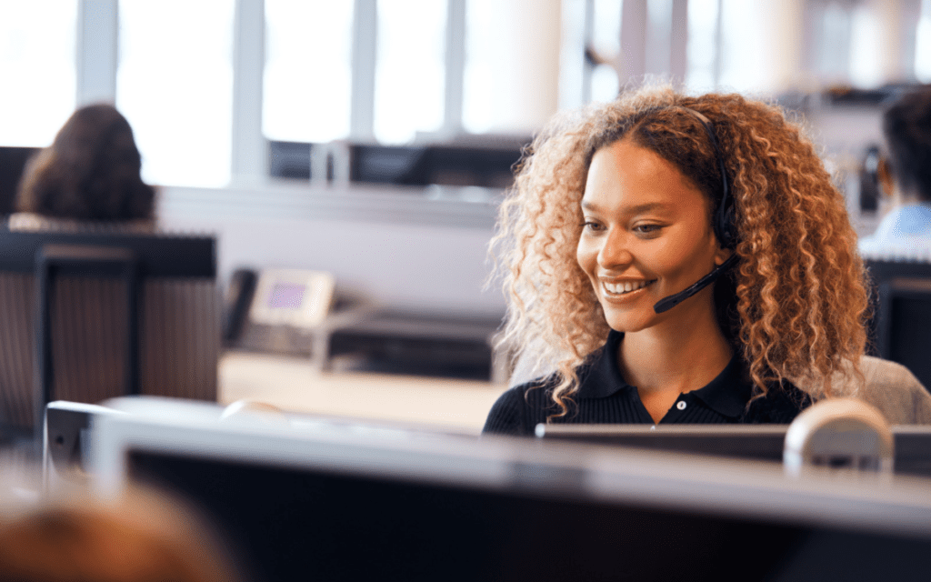 a woman works in a 911 center with resilient and redundant recording